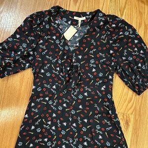 Maje mid-length lips, heart lipstick dress. Front ties around chest 2 buttons